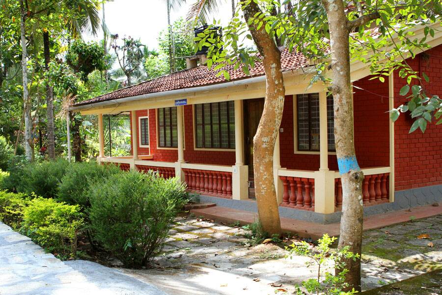 red cottage in kalpetta