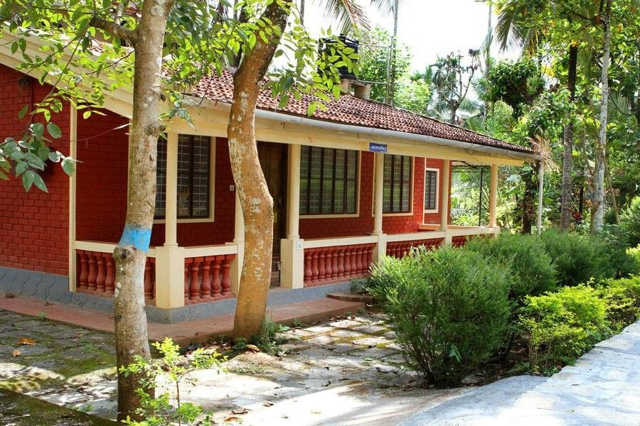 red cottage in kalpetta