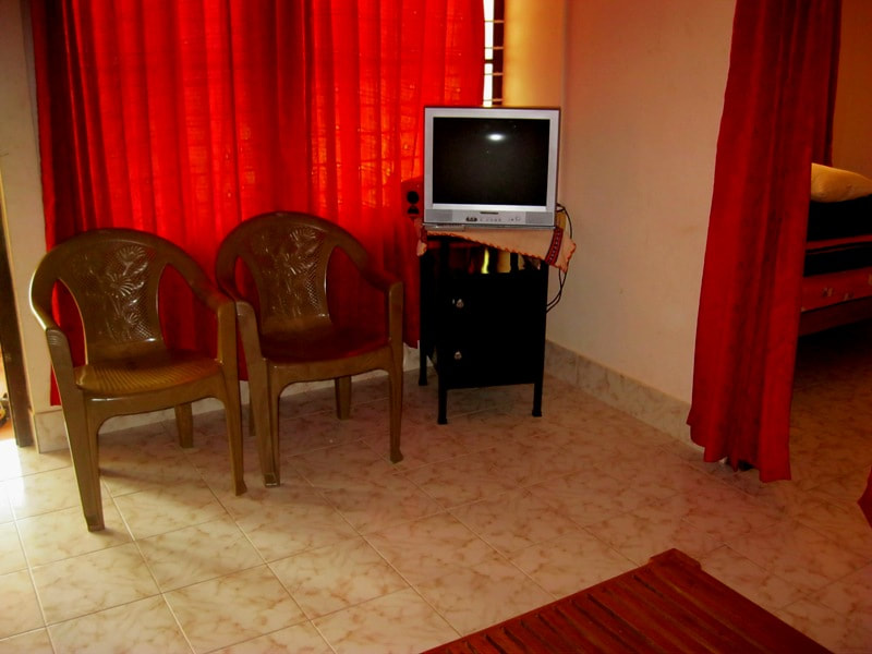 red cottage in kalpetta